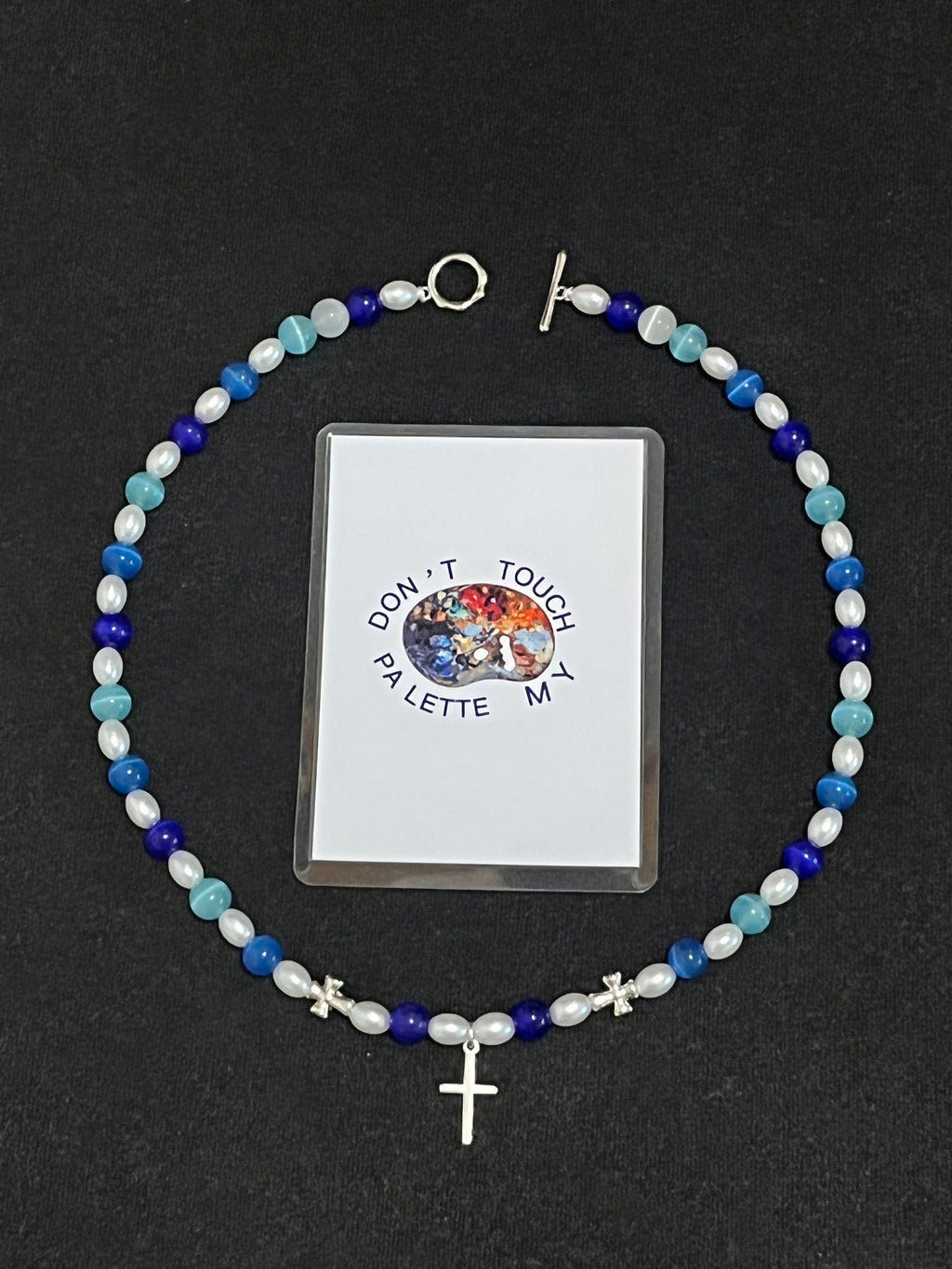 The "Chroma Rebel" Y2K Cat-Eye Cross Necklace — Polar Blue