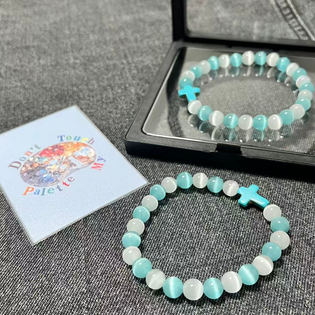 Premium packaging of SpiritPalette bracelet including a matte black floating frame box and a signature Don't Touch My Palette collector card.